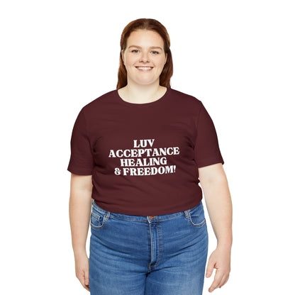 LUV, ACCEPTANCE, HEALING & FREEDOM WHT LETTER TEE